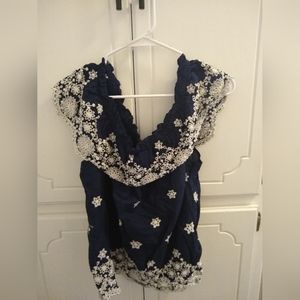 Blue and white floral ruffle off the shoulder blouse